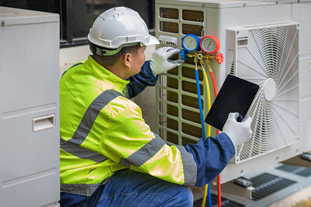 Professional Hvac technician working in Lansing, KS